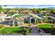 Aerial view of a well-maintained property featuring a landscaped yard and desert landscaping at 19903 E Augustus Ave, Queen Creek, AZ 85142