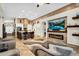 Spacious living area with open-concept design, seamlessly connecting to the kitchen and modern amenities at 19903 E Augustus Ave, Queen Creek, AZ 85142
