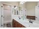 Bathroom featuring dual vanity, bath, shower and good lighting at 20453 W Daniel Pl, Buckeye, AZ 85396