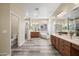 Bright bathroom featuring double sinks, soaking tub, and large shower for a spa-like experience at 20453 W Daniel Pl, Buckeye, AZ 85396
