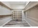 Walk-in closet with ample shelving and storage, perfect for organizing your wardrobe at 20453 W Daniel Pl, Buckeye, AZ 85396