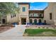 The Center on Main is a beautiful building with inviting entrance, outdoor seating and manicured landscaping at 20453 W Daniel Pl, Buckeye, AZ 85396