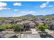 Beautiful single-Gathering home with well-maintained landscaping and mountain views in the distance at 20453 W Daniel Pl, Buckeye, AZ 85396