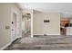 Spacious living room with hardwood floors and neutral paint palette, perfect for entertaining guests at 20453 W Daniel Pl, Buckeye, AZ 85396