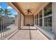 A long, covered patio includes recessed lighting, ceiling fan, and view of the pool at 20453 W Daniel Pl, Buckeye, AZ 85396