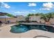 Enjoy this sparkling pool with fountains and mature landscaping at 20453 W Daniel Pl, Buckeye, AZ 85396