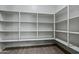Walk-in pantry featuring multiple shelves for optimal storage and organization at 21582 W Cocopah St, Buckeye, AZ 85326