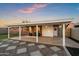 Covered patio includes an outdoor seating area overlooking the backyard at 2225 E Monterosa St, Phoenix, AZ 85016