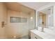 Modern bathroom showcasing a glass shower, marble countertop, and sleek fixtures at 2225 E Monterosa St, Phoenix, AZ 85016