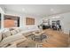 Bright and airy living room featuring a large sectional sofa and modern decor at 2225 E Monterosa St, Phoenix, AZ 85016