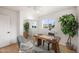 Modern office with wood desk, stylish chair, and bright light at 2225 E Monterosa St, Phoenix, AZ 85016