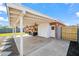 Covered patio with modern furnishings, providing an ideal space for outdoor lounging and entertaining overlooking manicured lawn at 2225 E Monterosa St, Phoenix, AZ 85016
