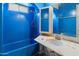Bathroom with a combined tub and shower, toilet and sink with mirror at 2230 N 12Th St # Rear, Phoenix, AZ 85006