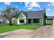 Charming single-Gathering home featuring a well-manicured lawn and vintage architectural details at 2230 N 12Th St # Rear, Phoenix, AZ 85006