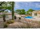 Scenic backyard featuring a pool, desert plants and cactus at 22756 N 91St Way, Scottsdale, AZ 85255