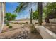Backyard dry creek bed with cacti and desert landscaping at 22756 N 91St Way, Scottsdale, AZ 85255