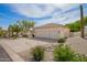 Exterior view of a home featuring a 3-car garage at 22756 N 91St Way, Scottsdale, AZ 85255