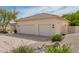 A spacious three-car garage on a landscaped lot at 22756 N 91St Way, Scottsdale, AZ 85255