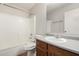 Bathroom featuring a shower-tub combo and modern sink at 2424 E Peach Tree Dr, Chandler, AZ 85249