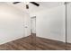 This bedroom features wood floors and neutral walls for a relaxing modern style at 2424 E Peach Tree Dr, Chandler, AZ 85249