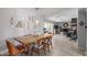 Elegant dining area adjacent to a spacious living room and ample natural light at 2444 S Noche De Paz --, Mesa, AZ 85202