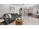 Open living space features a comfortable sofa, decorative elements, and dining area view at 2444 S Noche De Paz --, Mesa, AZ 85202