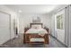 Comfortable main bedroom with carpet, natural light from the large window at 2444 S Noche De Paz --, Mesa, AZ 85202