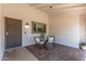 Private brick patio with stylish seating, perfect for relaxing outdoors at 2444 S Noche De Paz --, Mesa, AZ 85202