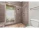 The primary shower features stone accents, a shower seat, and great lighting at 2616 S El Dorado --, Mesa, AZ 85202