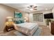 Cozy bedroom featuring a ceiling fan, a queen-sized bed and serene decor at 2616 S El Dorado --, Mesa, AZ 85202
