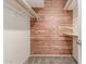 This walk-in closet features wood paneling and plenty of storage space at 2616 S El Dorado --, Mesa, AZ 85202