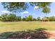 Large grassy park with playground, picnic areas, and mature trees, ideal for outdoor activities and relaxation at 2616 S El Dorado --, Mesa, AZ 85202