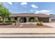 Charming single-story home with a well-manicured front yard and an inviting arched entryway at 2616 S El Dorado --, Mesa, AZ 85202