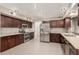 Modern kitchen featuring stainless steel appliances, new cabinets, and tile backsplash at 2616 S El Dorado --, Mesa, AZ 85202