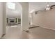 Bright and airy living room with modern tile flooring, skylights, and a stylish fireplace at 2616 S El Dorado --, Mesa, AZ 85202