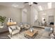 Bright living room boasts vaulted ceilings, skylights, and a comfortable seating area at 2616 S El Dorado --, Mesa, AZ 85202