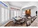 Open dining room with a big dining room table and fireplace at 322 E Gary Cir, Mesa, AZ 85201