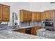 Spacious kitchen featuring stainless steel appliances and granite counters at 322 E Gary Cir, Mesa, AZ 85201