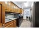 Laundry room with sink, storage, and modern washer and dryer at 322 E Gary Cir, Mesa, AZ 85201