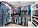 Walk-in closet with shoe racks, storage, and clothing racks at 322 E Gary Cir, Mesa, AZ 85201