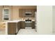 Updated kitchen with stainless steel appliances, a view of eat-in breakfast bar, and neutral finishes at 32229 N Garnet Way, San Tan Valley, AZ 85143