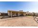 Wide view of the backyard with a covered patio area at 3256 W Libby St, Phoenix, AZ 85053