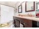 Bathroom with dual sinks and a white shower curtain at 3256 W Libby St, Phoenix, AZ 85053