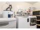 Functional laundry room with new washer and dryer at 3256 W Libby St, Phoenix, AZ 85053