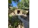 Well-maintained backyard featuring a shed, lawn, and mature trees, offering a private outdoor space at 3845 E Yeager Dr, Gilbert, AZ 85295