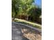 Lush backyard with a covered patio area perfect for outdoor entertaining and relaxing at 3845 E Yeager Dr, Gilbert, AZ 85295
