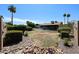 Backyard with potential, ready for landscaping with privacy hedges and rock detail at 3848 W Kings Ave, Phoenix, AZ 85053