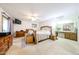 Generously sized primary bedroom offers ample closet space, carpet and serene atmosphere at 3848 W Kings Ave, Phoenix, AZ 85053
