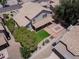Aerial view of the home highlighting the backyard, covered patio, and lush landscaping at 3921 W Jasper Dr, Chandler, AZ 85226