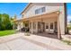 Covered patio with seating area and concrete flooring offers a relaxing outdoor space at 3921 W Jasper Dr, Chandler, AZ 85226